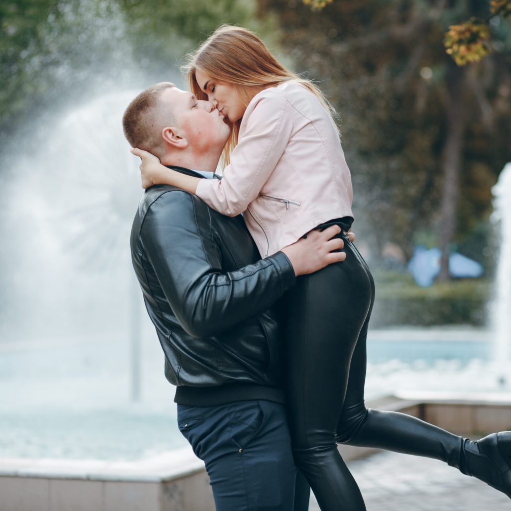 boy and girl walking in the autumn city